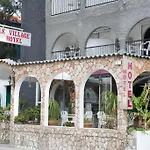 Le Village Hotel